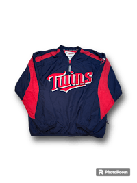 a minnesota twins jacket on a black background